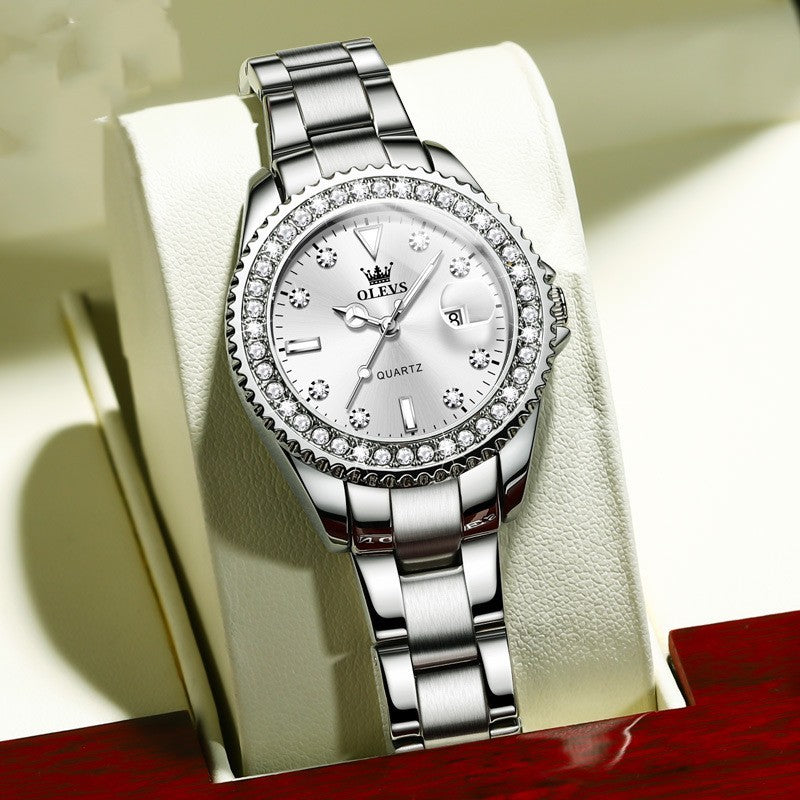 Reloj de mujer de cuarzo con diamantes y correa de acero inoxidable.