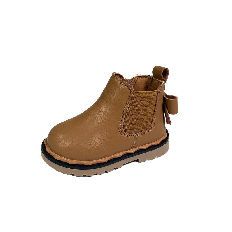 Botas Martin para niñas con lazo y caña alta.